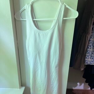 Brand new tennis dress with internal ball pockets